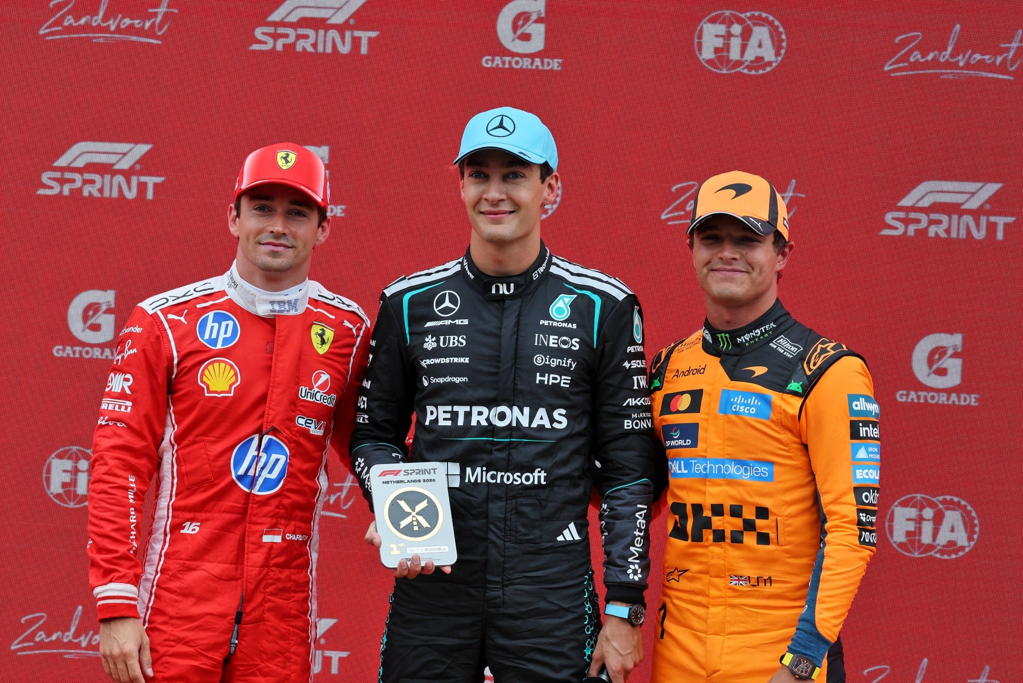 Sprint race top three in parc ferme (L to R): Charles Leclerc (MON) Scuderia Ferrari, second; George Russell (GBR) Mercedes AMG Formula One Team, race winner; Lando Norris (GBR) McLaren F1 Team, third.