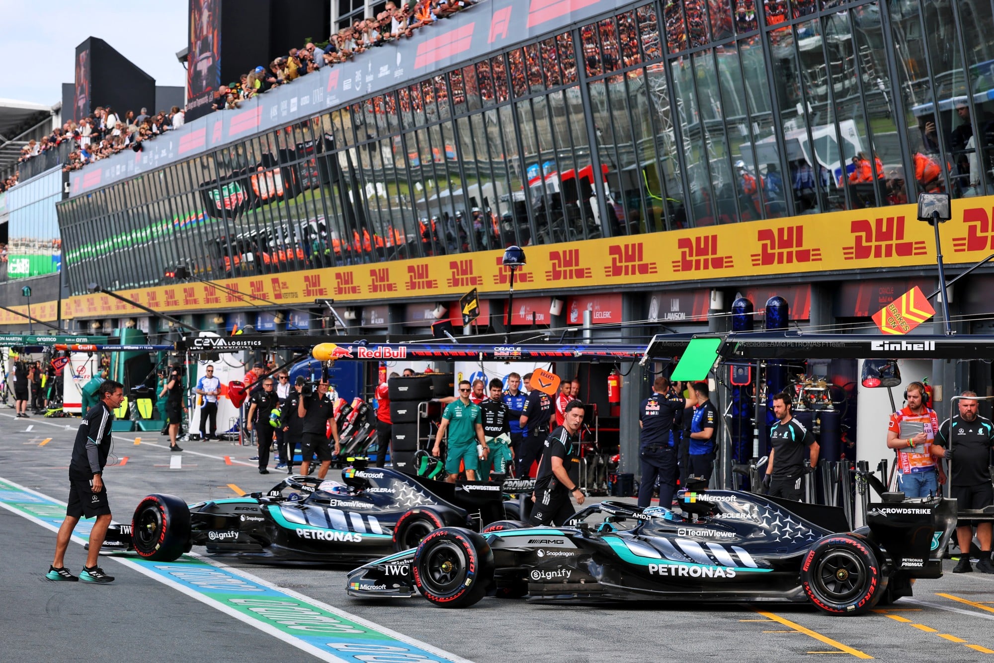 George Russell (GBR) Mercedes AMG Formula One Team W17 and Andrea Kimi Antonelli (ITA) Mercedes AMG Formula One Team W17 leave the pits.