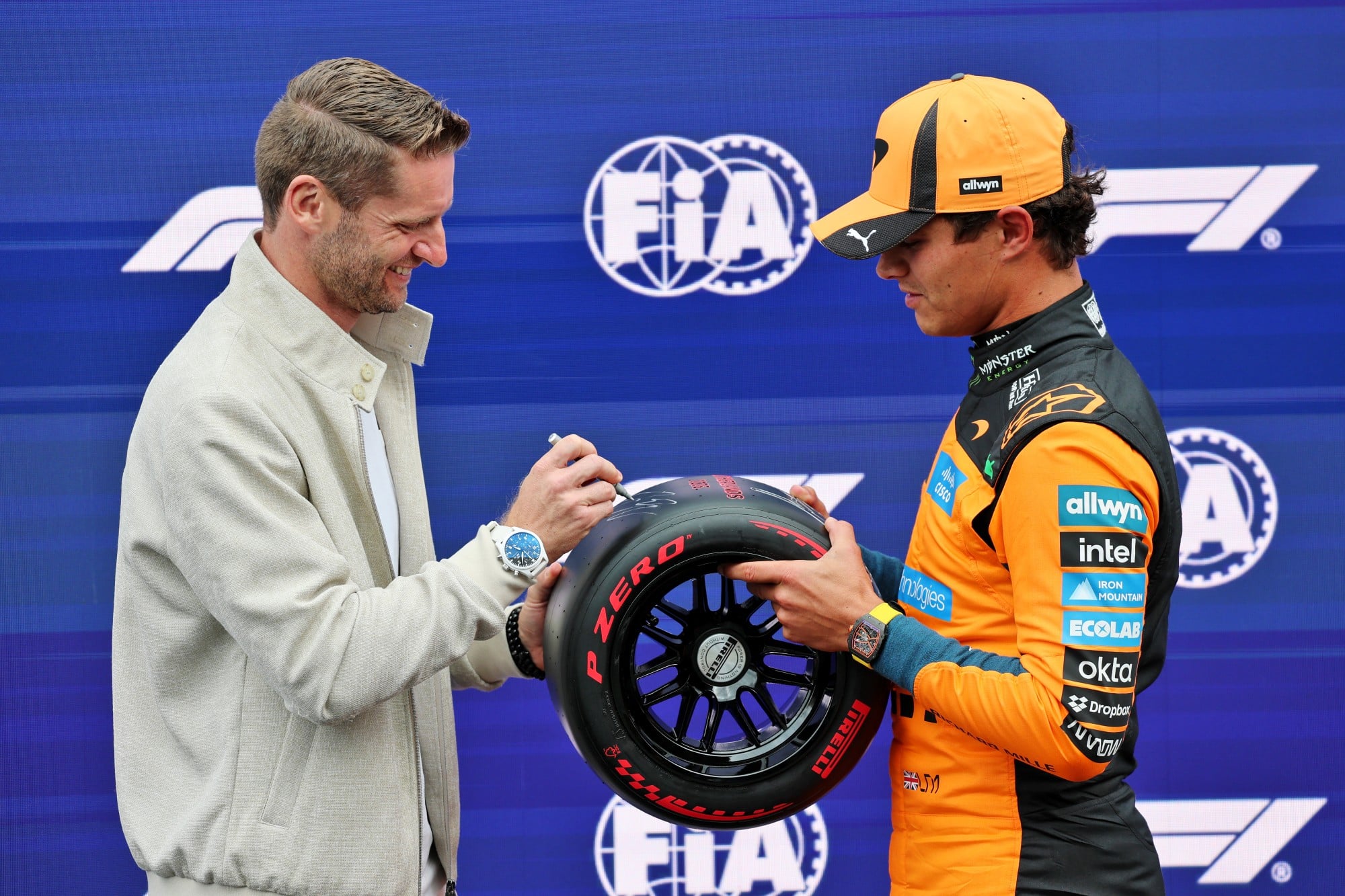 (L to R): Maro Engel (GER) Racing Driver presents the Pirelli Pole Position Award to Lando Norris (GBR) McLaren F1 Team in qualifying parc ferme.