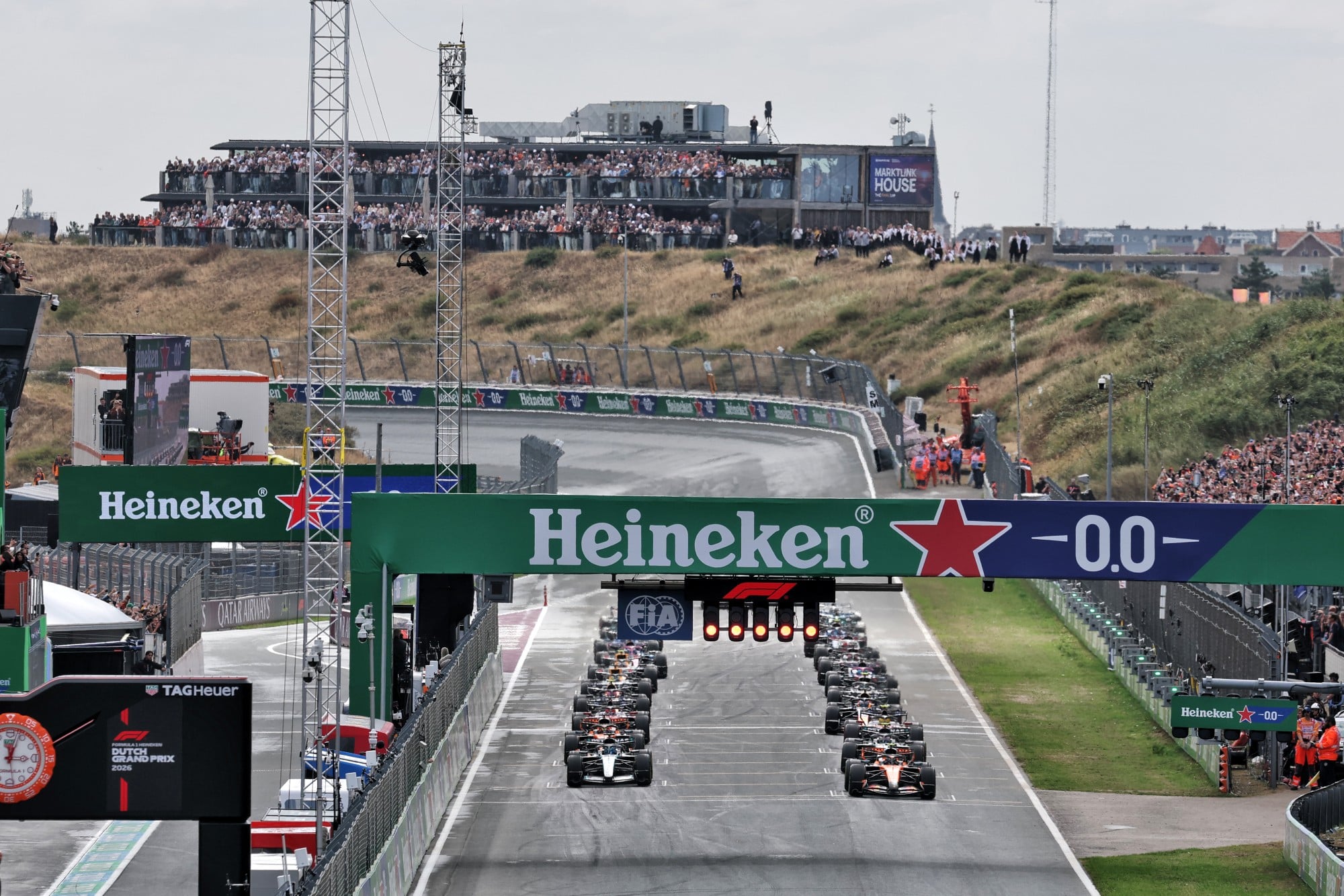 Lando Norris (GBR) McLaren F1 Team MCL40 leads at the start of the race.