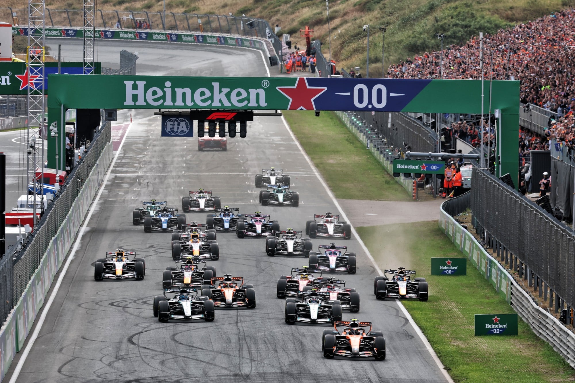 Lando Norris (GBR) McLaren F1 Team MCL40 leads at the start of the race.