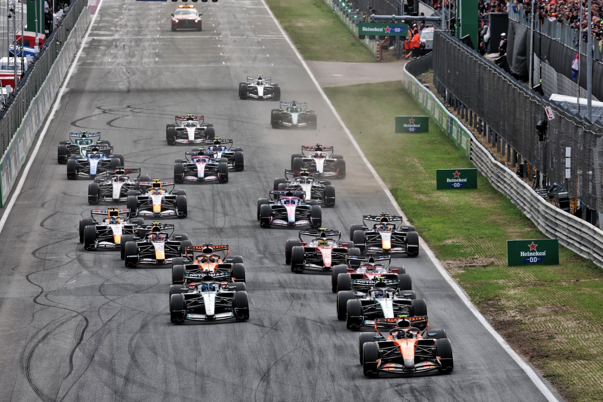 Lando Norris (GBR) McLaren F1 Team MCL40 leads at the start of the race.