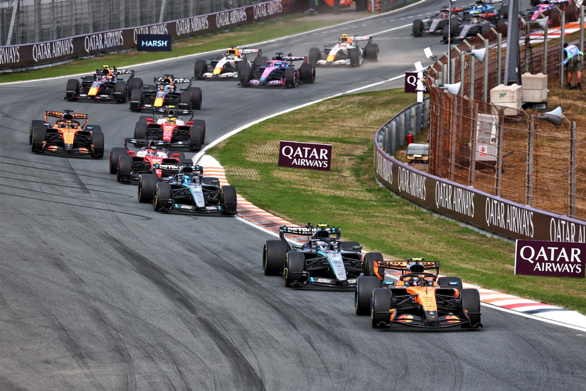 Lando Norris (GBR) McLaren F1 Team MCL40 leads at the start of the race.