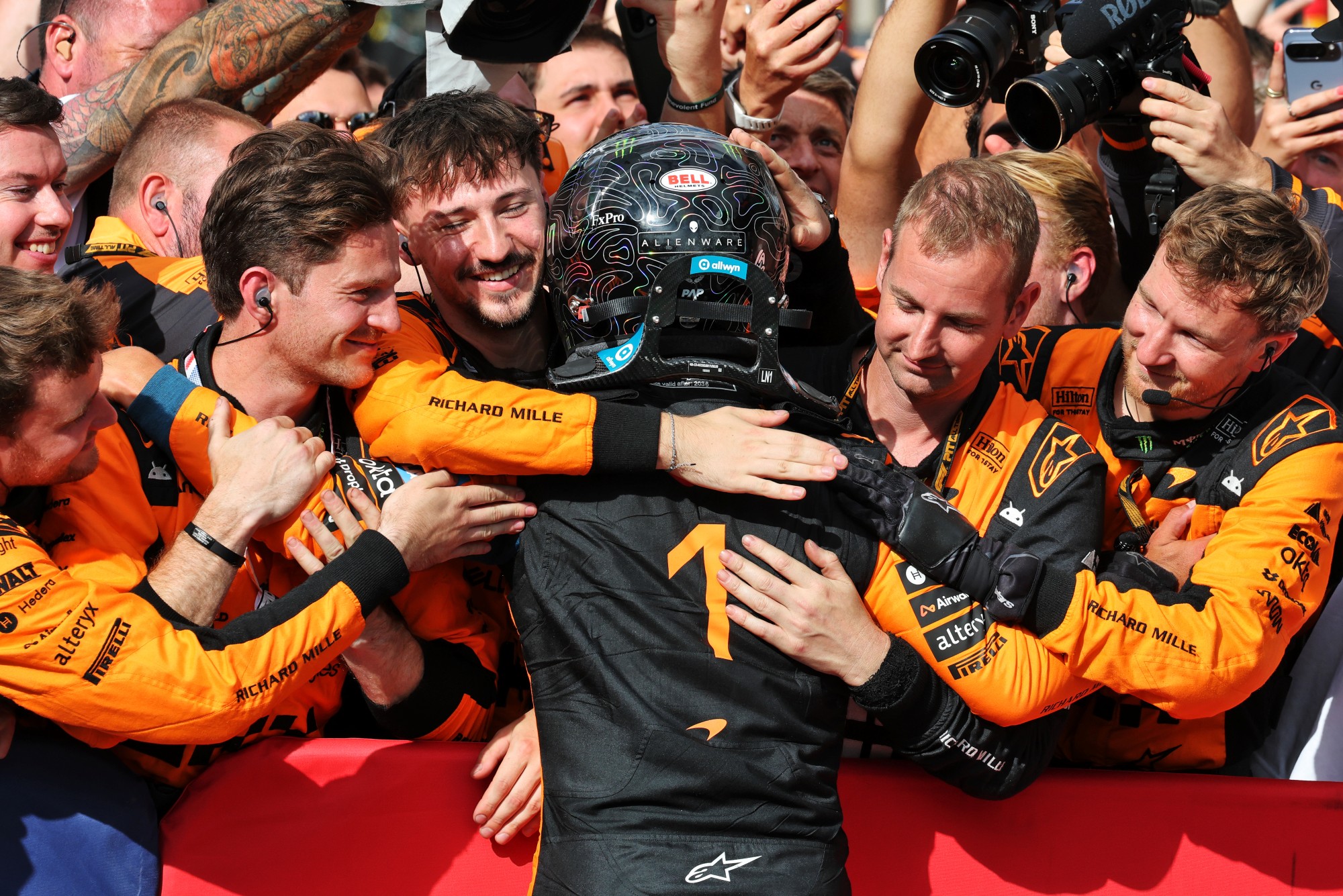 Race winner Lando Norris (GBR) McLaren F1 Team celebrates with the team in parc ferme.