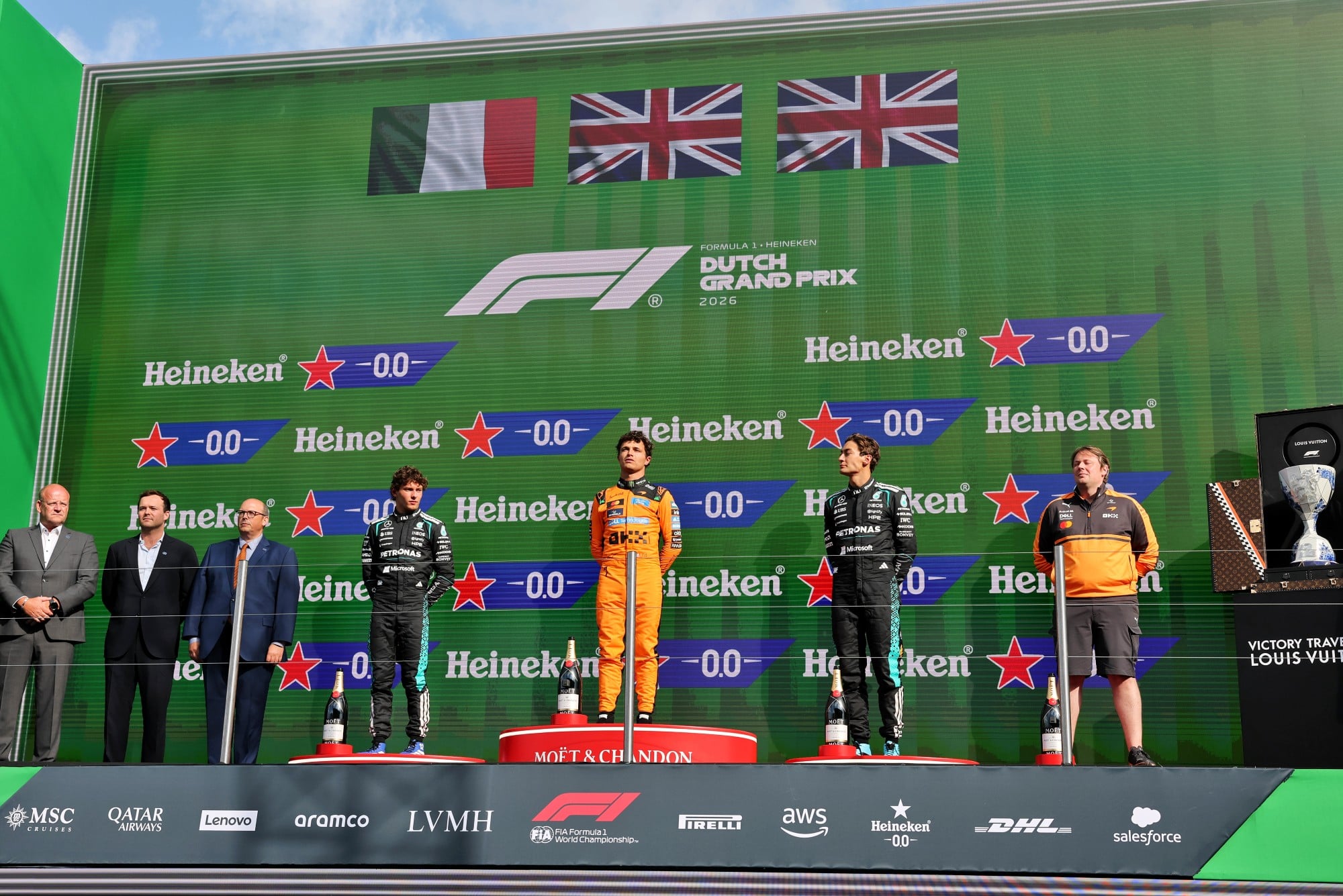 The podium (L to R): Andrea Kimi Antonelli (ITA) Mercedes AMG Formula One Team, second; Lando Norris (GBR) McLaren F1 Team, race winner; George Russell (GBR) Mercedes AMG Formula One Team W17, third; Adrian Goodwin (GBR) McLaren F1 Team Associate Director, Race Engineering.