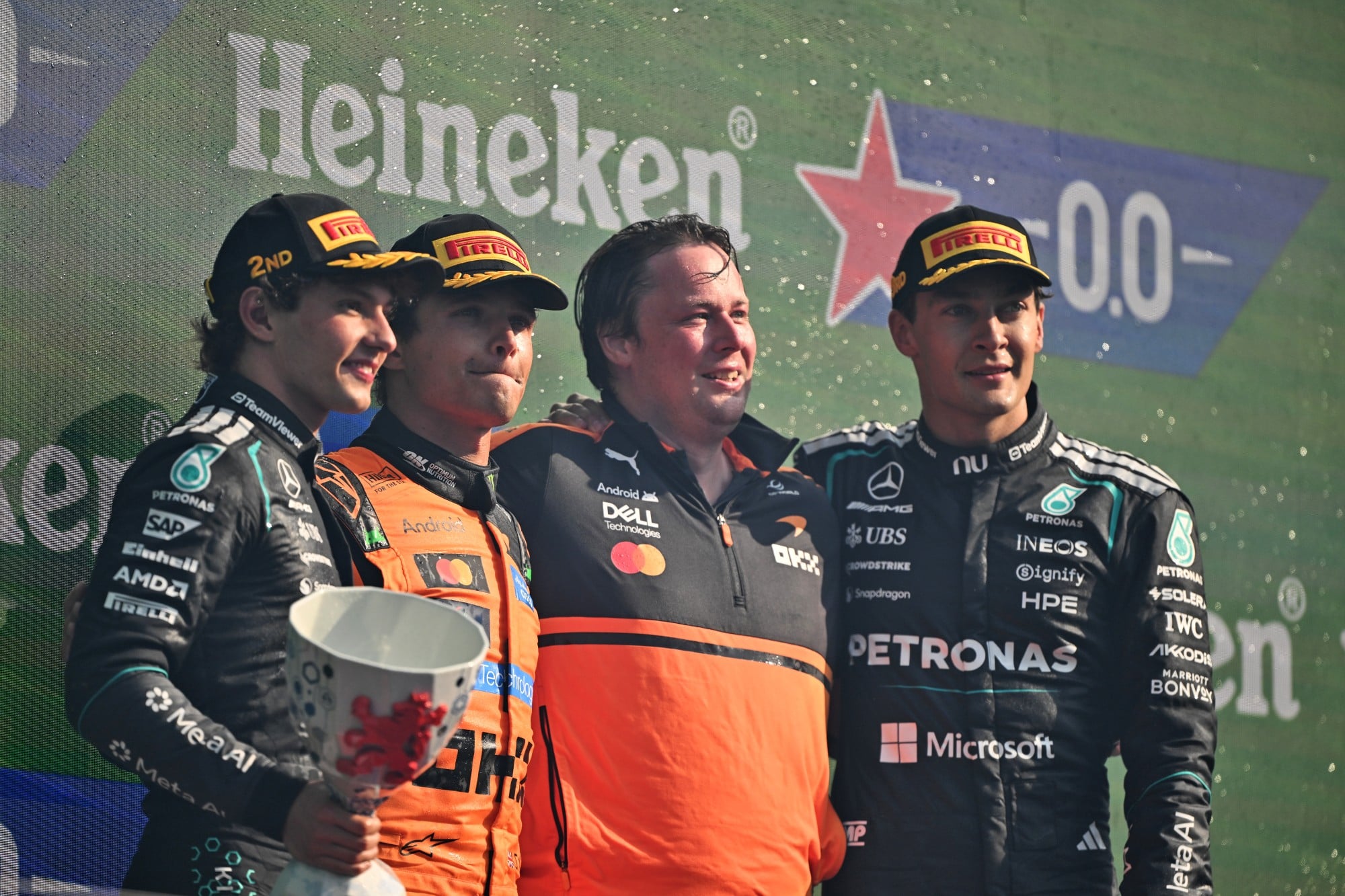 The podium (L to R): Andrea Kimi Antonelli (ITA) Mercedes AMG Formula One Team, second; Lando Norris (GBR) McLaren F1 Team, race winner; Adrian Goodwin (GBR) McLaren F1 Team Associate Director, Race Engineering; George Russell (GBR) Mercedes AMG Formula One Team W17, third.