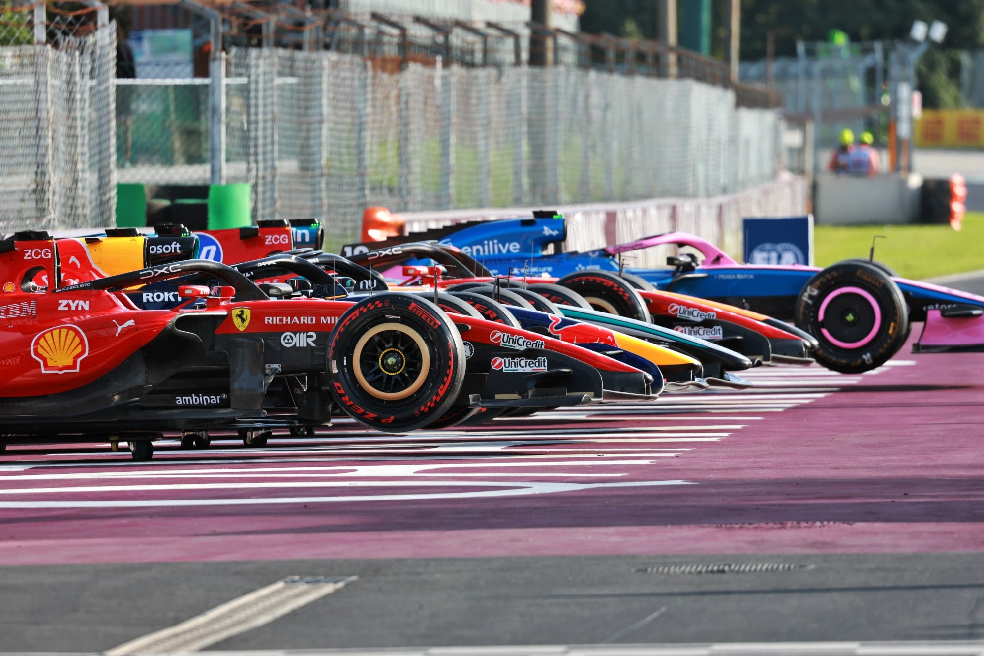 Scuderia Ferrari SF-26 with others in parc ferme.