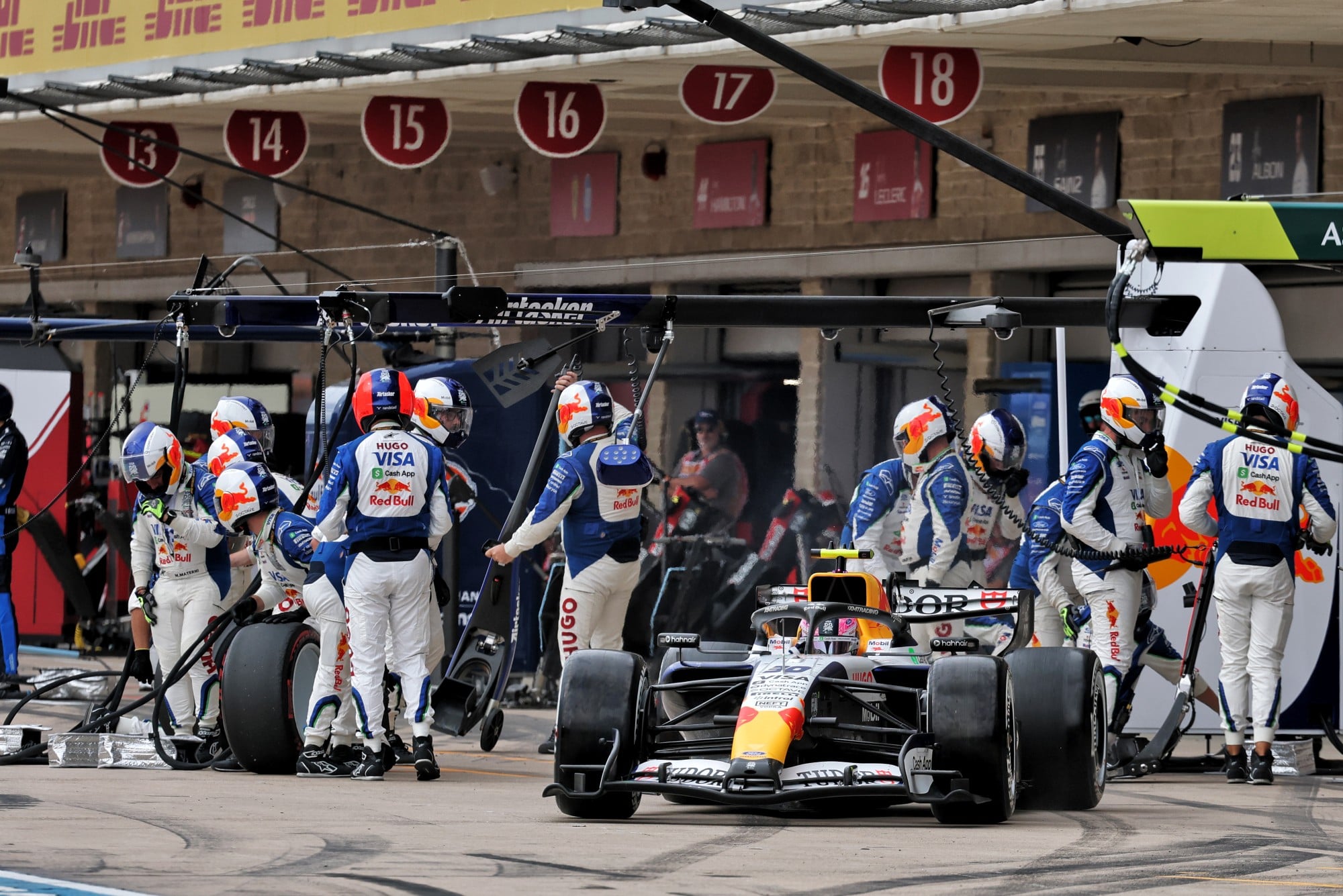Liam Lawson (NZL) Racing Bulls Formula One Team VCARB 03 makes a pit stop.