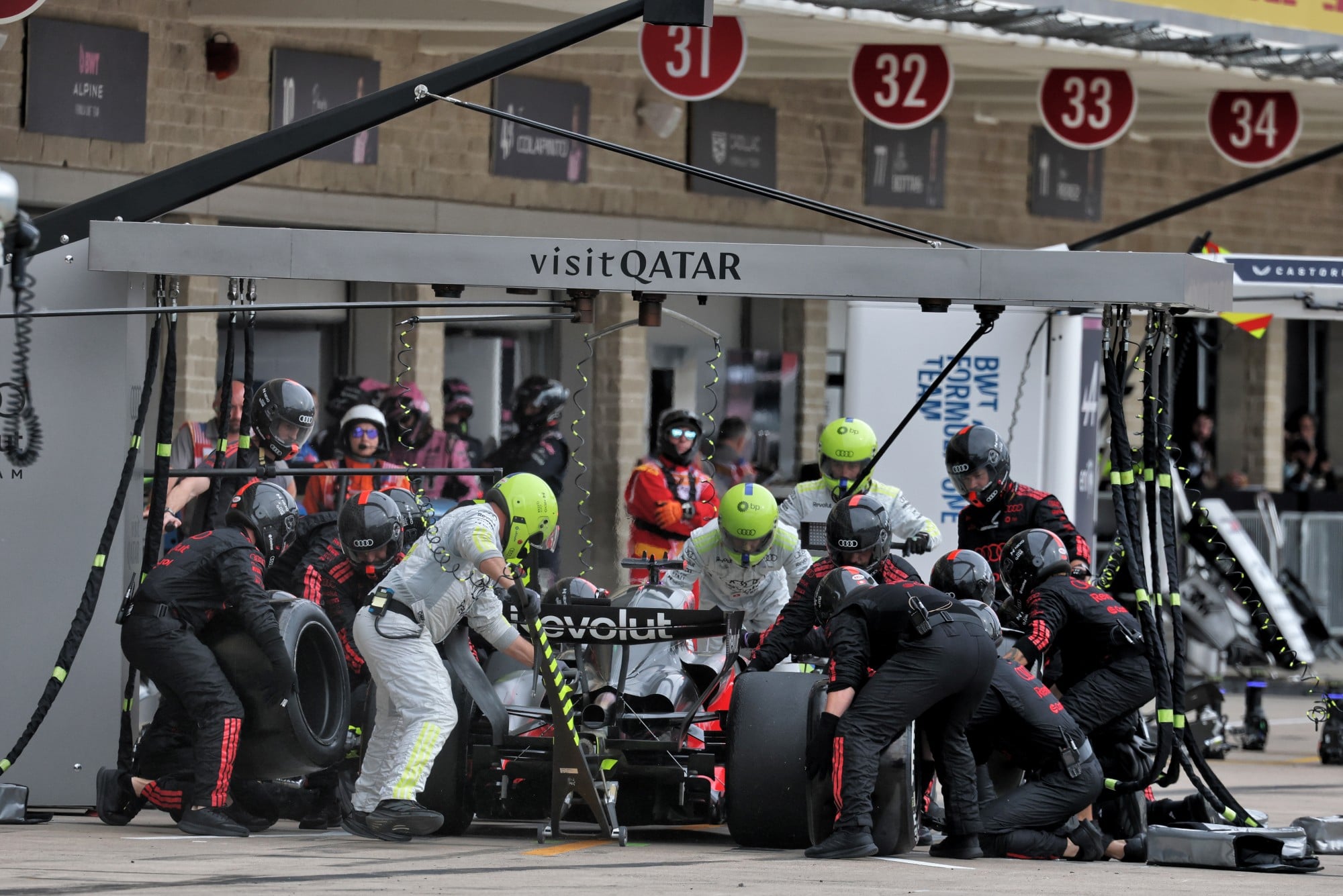 Nico Hulkenberg (GER) Audi F1 Team R26 makes a pit stop.