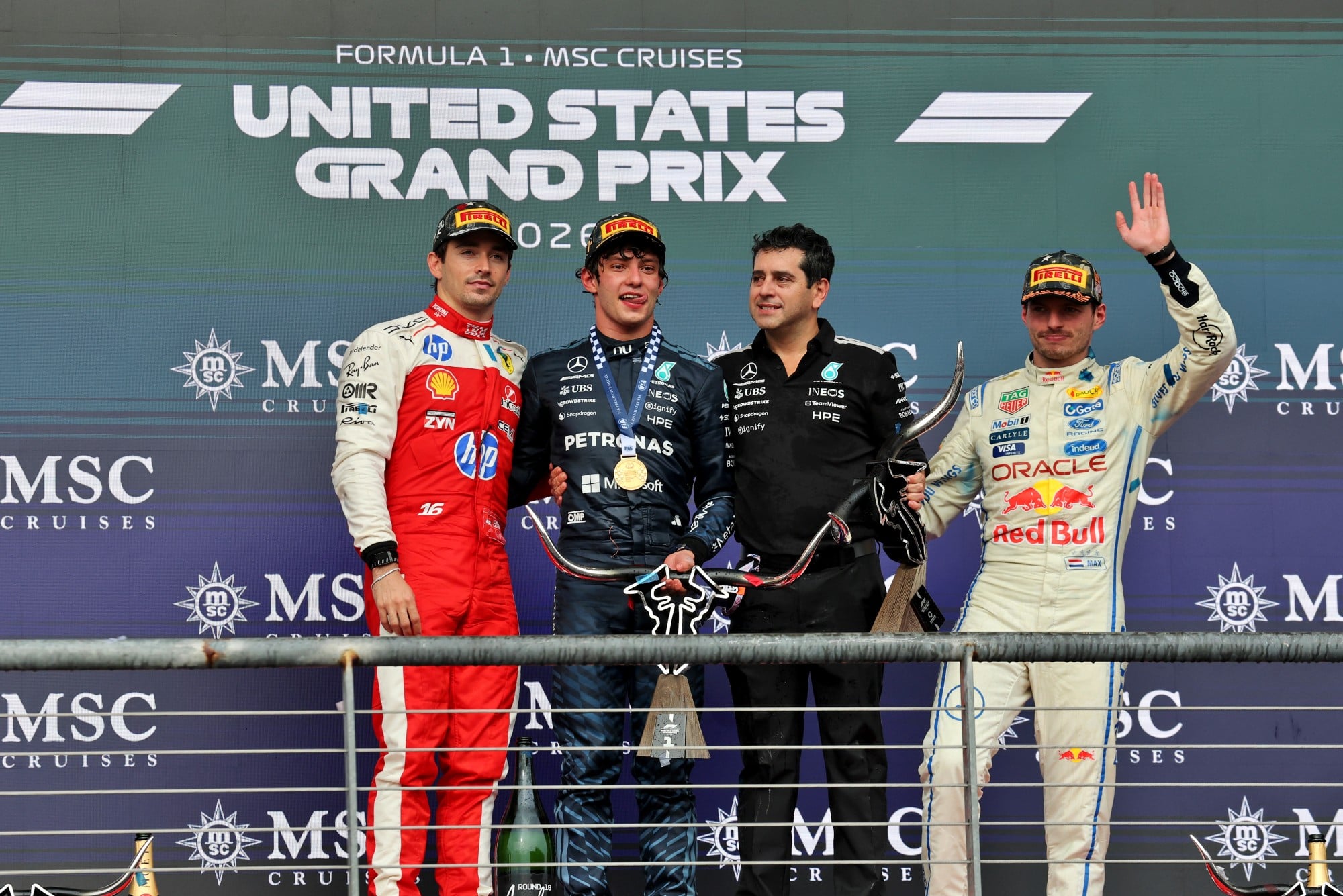 The podium (L to R): Charles Leclerc (MON) Scuderia Ferrari, second; Andrea Kimi Antonelli (ITA) Mercedes AMG Formula One Team race winner; Jarrod Murphy (GBR) Mercedes AMG F1 Formula One Team Aerodynamics Director; Max Verstappen (NLD) Red Bull Racing, third.