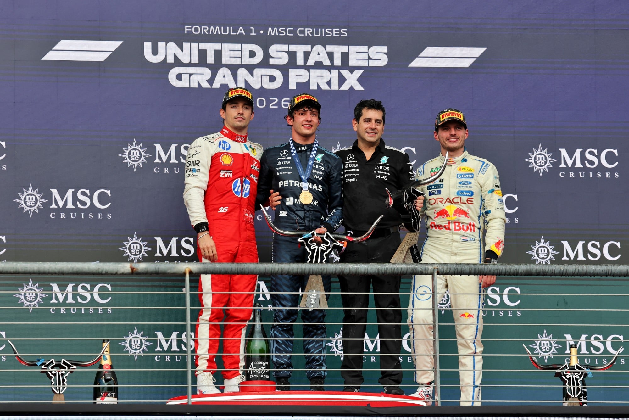 The podium (L to R): Charles Leclerc (MON) Scuderia Ferrari, second; Andrea Kimi Antonelli (ITA) Mercedes AMG Formula One Team race winner; Jarrod Murphy (GBR) Mercedes AMG F1 Formula One Team Aerodynamics Director; Max Verstappen (NLD) Red Bull Racing, third.