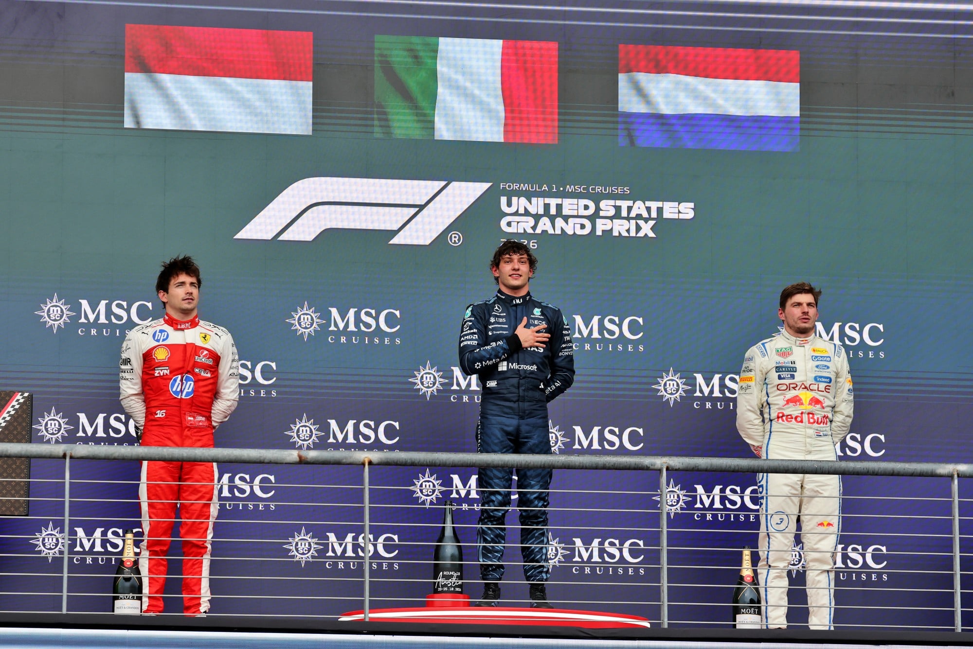 The podium (L to R): Charles Leclerc (MON) Scuderia Ferrari, second; Andrea Kimi Antonelli (ITA) Mercedes AMG Formula One Team race winner; Max Verstappen (NLD) Red Bull Racing, third.